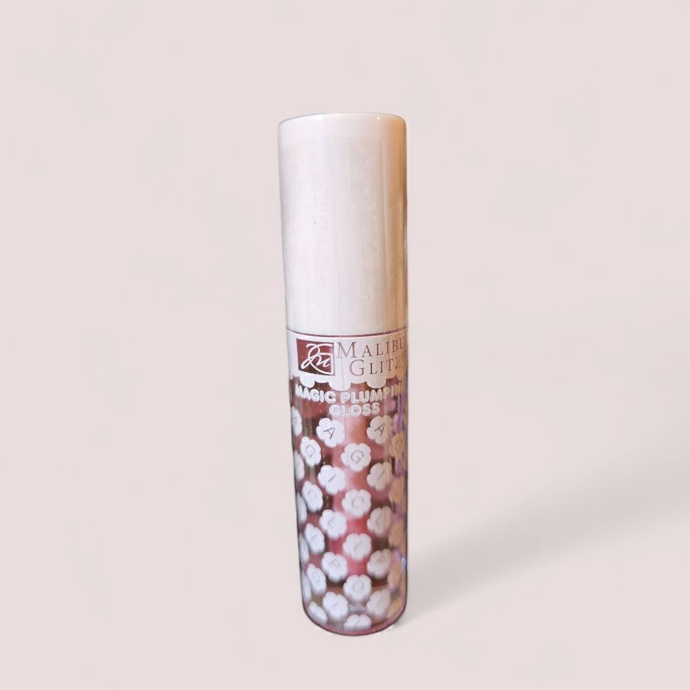 New! Malibu Glitz PH Activated Plumping Gloss Love these so much!!!